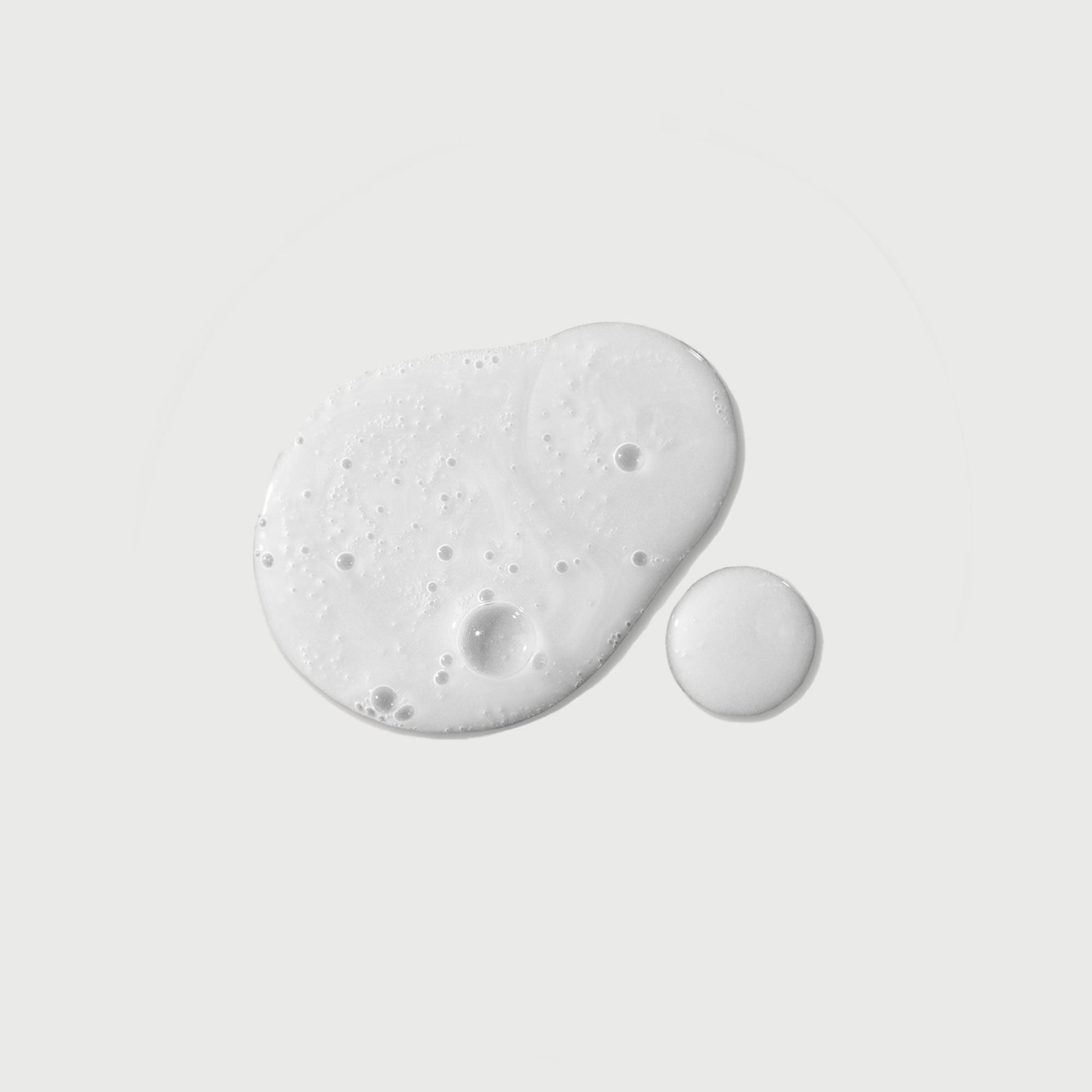 the-purifier-niacinamide-serum-body-wash-j1 NATR-40012-Swatch-The-Purifier-Niacinamide-Serum-Body-Wash-bonebkgd.jpg